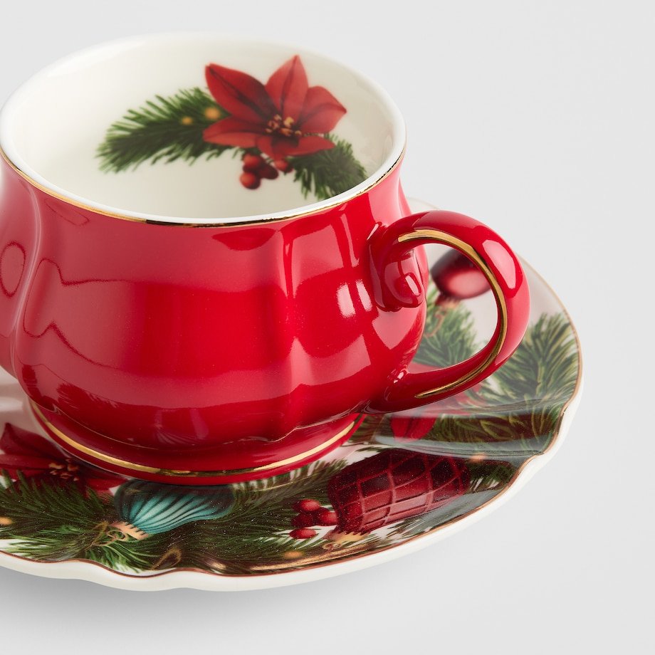 filiżanka z symbolem poinsecji